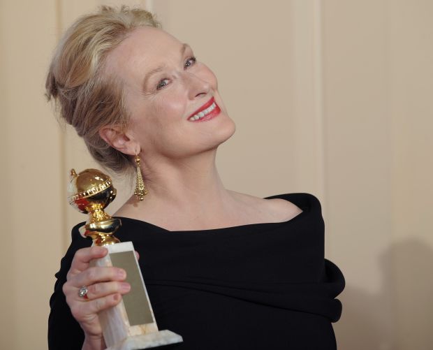 Meryl Streep poses with the award for best actress in a motion picture, comedy or musical for Julie and Julia backstage at the 67th Annual Golden Globe Awards on Sunday, Jan. 17, 2010, in Beverly Hills, Calif. (AP Photo/Mark J. Terrill)