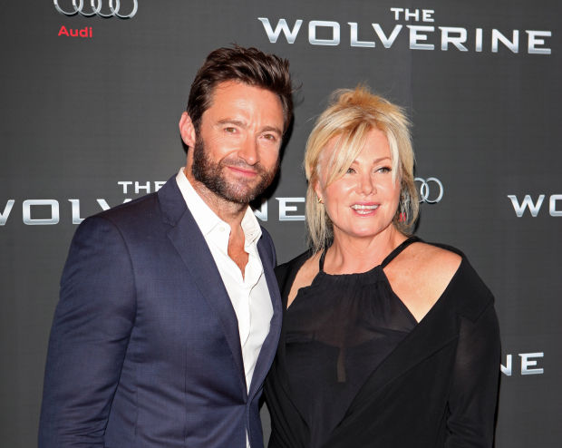 LONDON, ENGLAND - JULY 16: (EMBARGOED FOR PUBLICATION IN UK TABLOID NEWSPAPERS UNTIL 48 HOURS AFTER CREATE DATE AND TIME. MANDATORY CREDIT PHOTO BY DAVE M. BENETT/WIREIMAGE REQUIRED) Hugh Jackman (L) and wife Deborra-Lee Furness attend the UK Premiere of 'The Wolverine' at Empire Leicester Square on July 16, 2013 in London, England. (Photo by Dave M. Benett/WireImage)